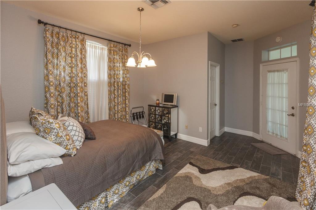 8001 SAINT ANDREWS CIRCLE, ORLANDO, Florida 32835, 3 Bedrooms Bedrooms, 9 Rooms Rooms,3 BathroomsBathrooms,Residential,For sale,SAINT ANDREWS,O5550643