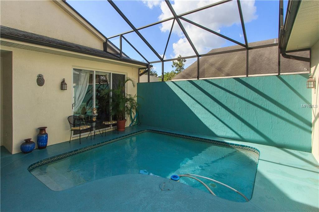 8001 SAINT ANDREWS CIRCLE, ORLANDO, Florida 32835, 3 Bedrooms Bedrooms, 9 Rooms Rooms,3 BathroomsBathrooms,Residential,For sale,SAINT ANDREWS,O5550643