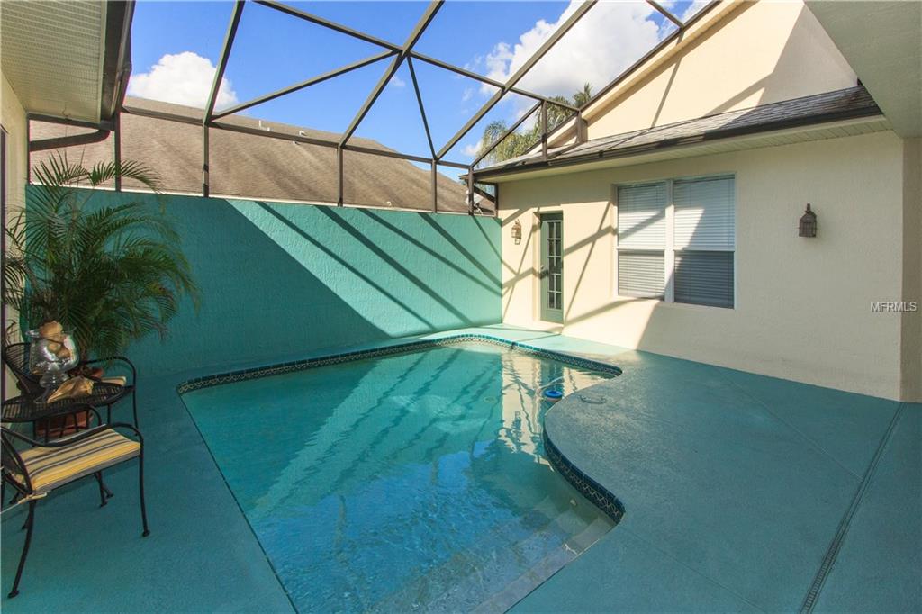 8001 SAINT ANDREWS CIRCLE, ORLANDO, Florida 32835, 3 Bedrooms Bedrooms, 9 Rooms Rooms,3 BathroomsBathrooms,Residential,For sale,SAINT ANDREWS,O5550643