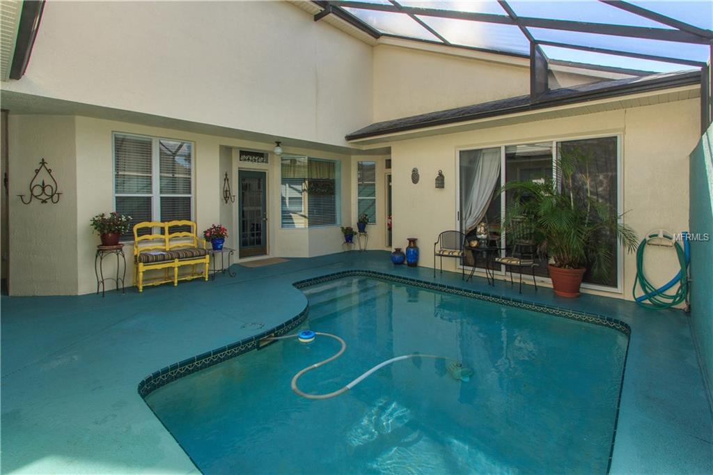 8001 SAINT ANDREWS CIRCLE, ORLANDO, Florida 32835, 3 Bedrooms Bedrooms, 9 Rooms Rooms,3 BathroomsBathrooms,Residential,For sale,SAINT ANDREWS,O5550643