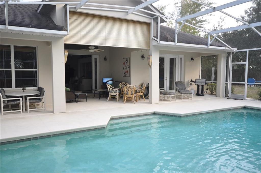 130 PINEWOOD COURT, DAVENPORT, Florida 33896, 3 Bedrooms Bedrooms, 9 Rooms Rooms,3 BathroomsBathrooms,Residential,For sale,PINEWOOD,O5558388