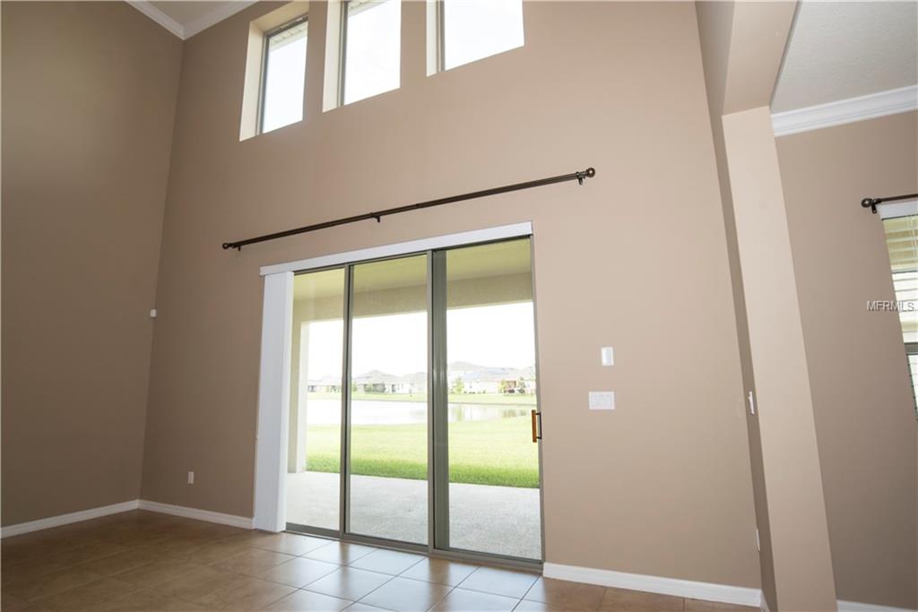 4137 SCARLET BRANCH ROAD, ORLANDO, Florida 32824, 4 Bedrooms Bedrooms, 3 Rooms Rooms,3 BathroomsBathrooms,Residential,For sale,SCARLET BRANCH,S4850786