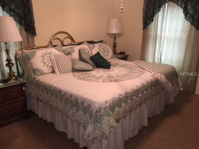 38017 ROLLING ACRES ROAD, LADY LAKE, Florida 32159, 3 Bedrooms Bedrooms, 7 Rooms Rooms,2 BathroomsBathrooms,Residential,For sale,ROLLING ACRES,G4851638