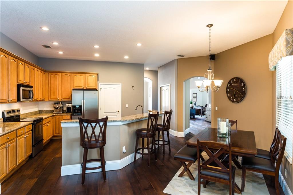 1044 WINDING WATERS CIRCLE, WINTER SPRINGS, Florida 32708, 4 Bedrooms Bedrooms, 9 Rooms Rooms,3 BathroomsBathrooms,Residential,For sale,WINDING WATERS,O5561752