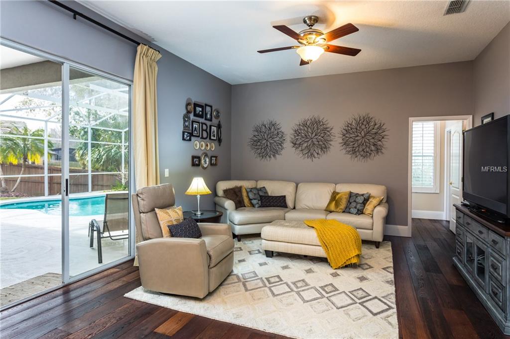 1044 WINDING WATERS CIRCLE, WINTER SPRINGS, Florida 32708, 4 Bedrooms Bedrooms, 9 Rooms Rooms,3 BathroomsBathrooms,Residential,For sale,WINDING WATERS,O5561752