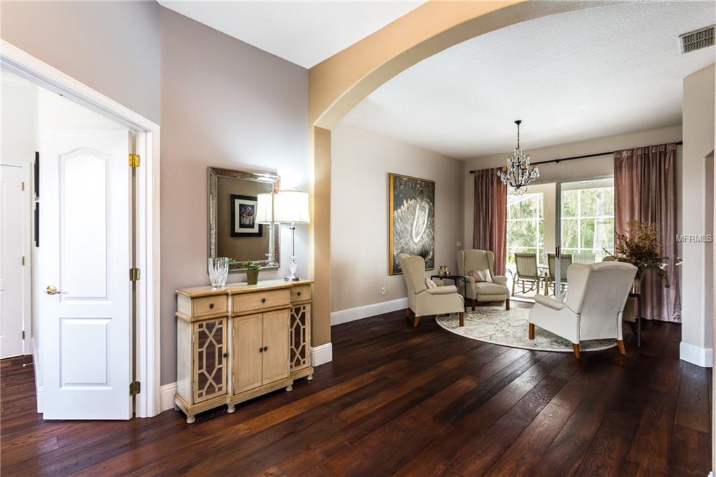 1044 WINDING WATERS CIRCLE, WINTER SPRINGS, Florida 32708, 4 Bedrooms Bedrooms, 9 Rooms Rooms,3 BathroomsBathrooms,Residential,For sale,WINDING WATERS,O5561752