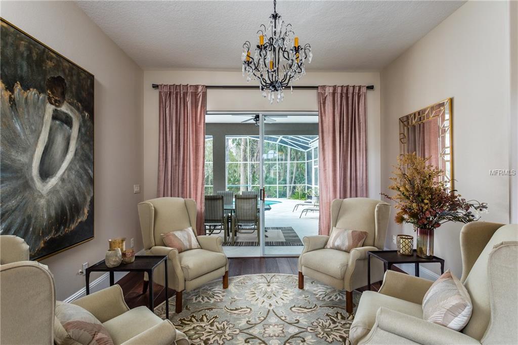 1044 WINDING WATERS CIRCLE, WINTER SPRINGS, Florida 32708, 4 Bedrooms Bedrooms, 9 Rooms Rooms,3 BathroomsBathrooms,Residential,For sale,WINDING WATERS,O5561752