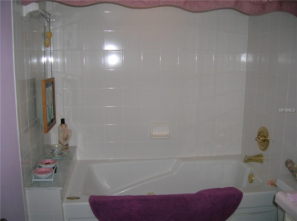 1309 PINE RIDGE CIRCLE E, TARPON SPRINGS, Florida 34688, 2 Bedrooms Bedrooms, 5 Rooms Rooms,2 BathroomsBathrooms,Residential,For sale,PINE RIDGE,W7636916