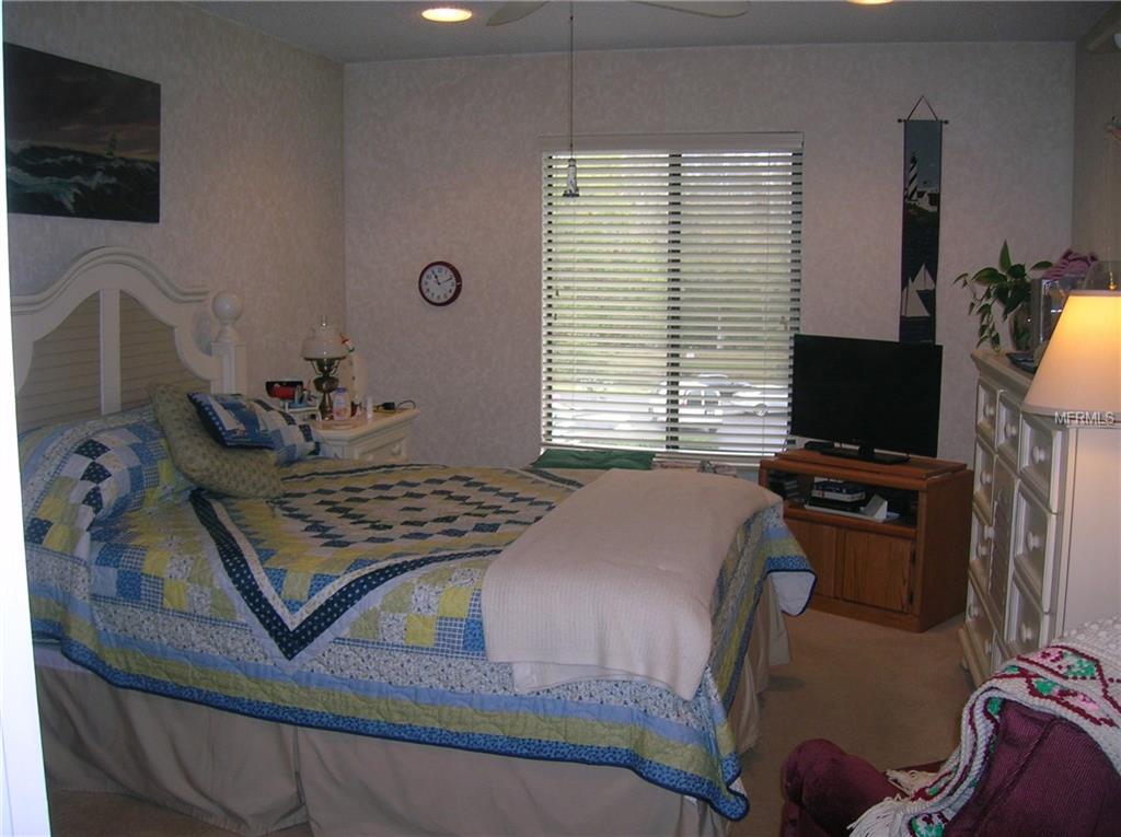 1309 PINE RIDGE CIRCLE E, TARPON SPRINGS, Florida 34688, 2 Bedrooms Bedrooms, 5 Rooms Rooms,2 BathroomsBathrooms,Residential,For sale,PINE RIDGE,W7636916