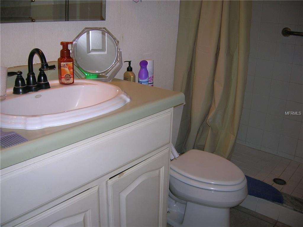 1309 PINE RIDGE CIRCLE E, TARPON SPRINGS, Florida 34688, 2 Bedrooms Bedrooms, 5 Rooms Rooms,2 BathroomsBathrooms,Residential,For sale,PINE RIDGE,W7636916