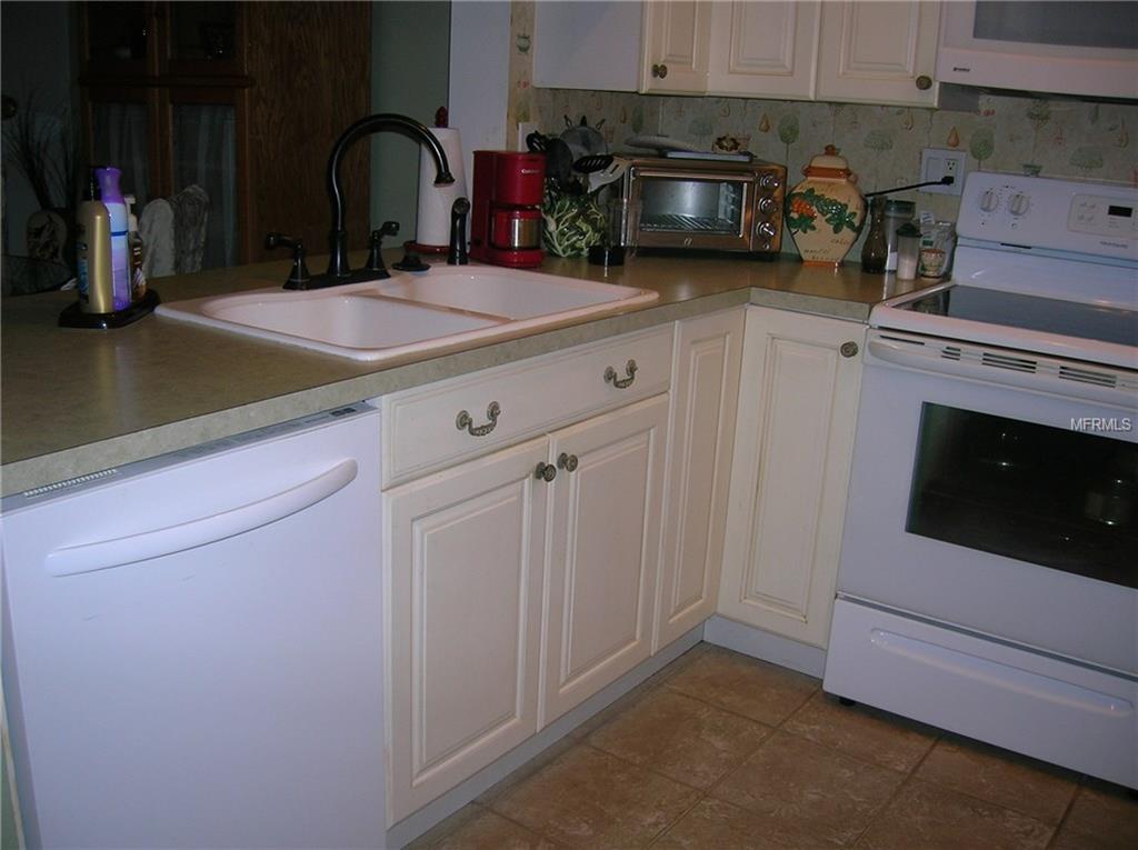 1309 PINE RIDGE CIRCLE E, TARPON SPRINGS, Florida 34688, 2 Bedrooms Bedrooms, 5 Rooms Rooms,2 BathroomsBathrooms,Residential,For sale,PINE RIDGE,W7636916