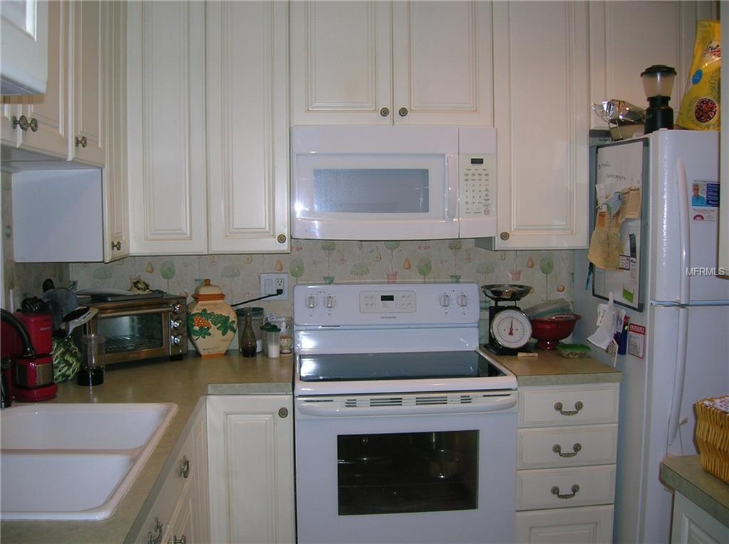 1309 PINE RIDGE CIRCLE E, TARPON SPRINGS, Florida 34688, 2 Bedrooms Bedrooms, 5 Rooms Rooms,2 BathroomsBathrooms,Residential,For sale,PINE RIDGE,W7636916