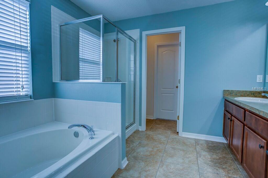 5594 RUTHERFORD PLACE, OVIEDO, Florida 32765, 4 Bedrooms Bedrooms, 6 Rooms Rooms,2 BathroomsBathrooms,Residential,For sale,RUTHERFORD,O5557520