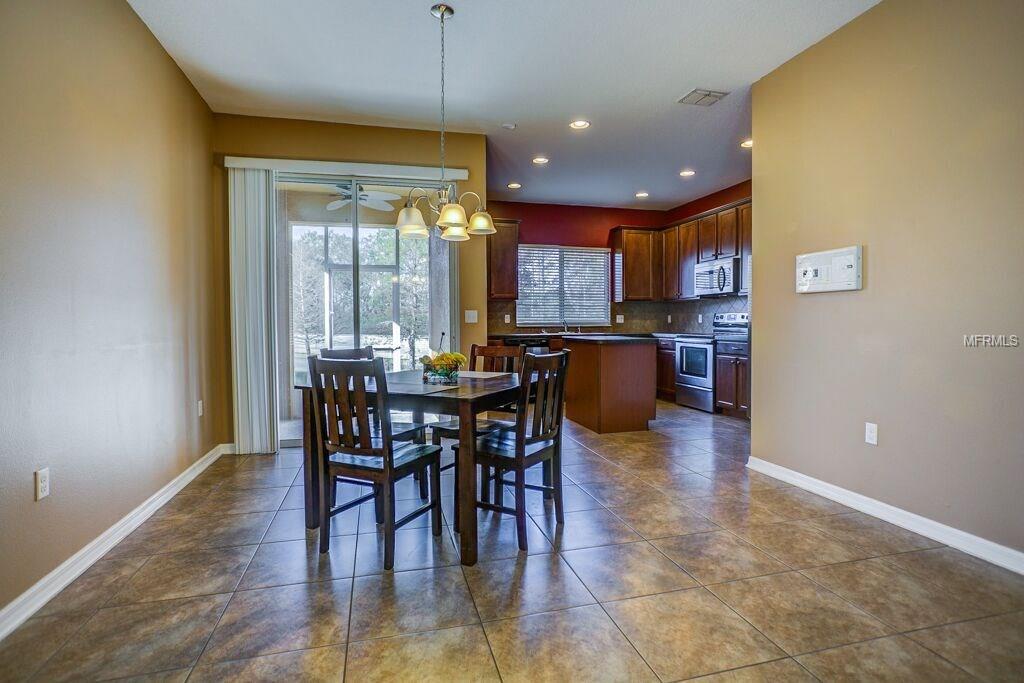 5594 RUTHERFORD PLACE, OVIEDO, Florida 32765, 4 Bedrooms Bedrooms, 6 Rooms Rooms,2 BathroomsBathrooms,Residential,For sale,RUTHERFORD,O5557520