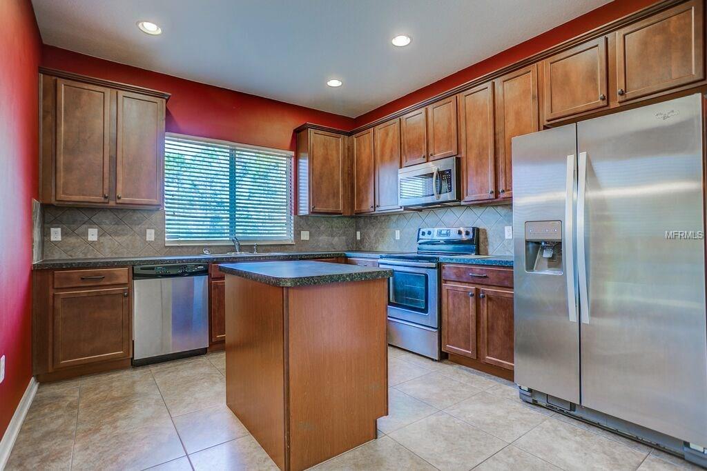 5594 RUTHERFORD PLACE, OVIEDO, Florida 32765, 4 Bedrooms Bedrooms, 6 Rooms Rooms,2 BathroomsBathrooms,Residential,For sale,RUTHERFORD,O5557520