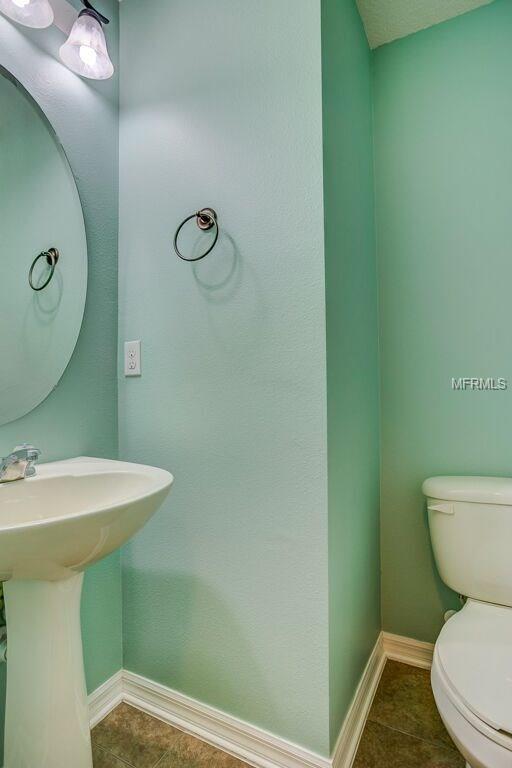 5594 RUTHERFORD PLACE, OVIEDO, Florida 32765, 4 Bedrooms Bedrooms, 6 Rooms Rooms,2 BathroomsBathrooms,Residential,For sale,RUTHERFORD,O5557520