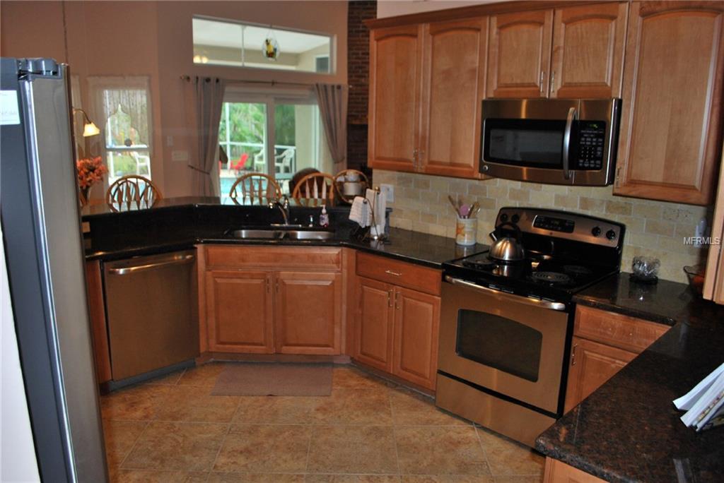 1589 CARILLON PARK DRIVE, OVIEDO, Florida 32765, 6 Bedrooms Bedrooms, 10 Rooms Rooms,4 BathroomsBathrooms,Residential,For sale,CARILLON PARK,O5556495