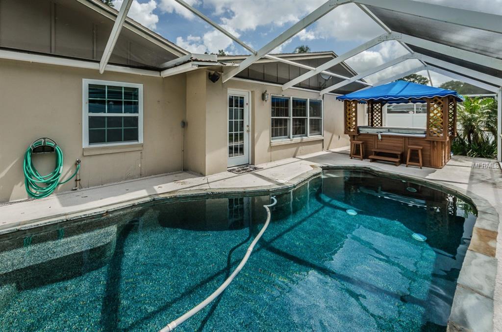 105 WOODBURN COURT, SAFETY HARBOR, Florida 34695, 4 Bedrooms Bedrooms, 9 Rooms Rooms,2 BathroomsBathrooms,Residential,For sale,WOODBURN,U7830761