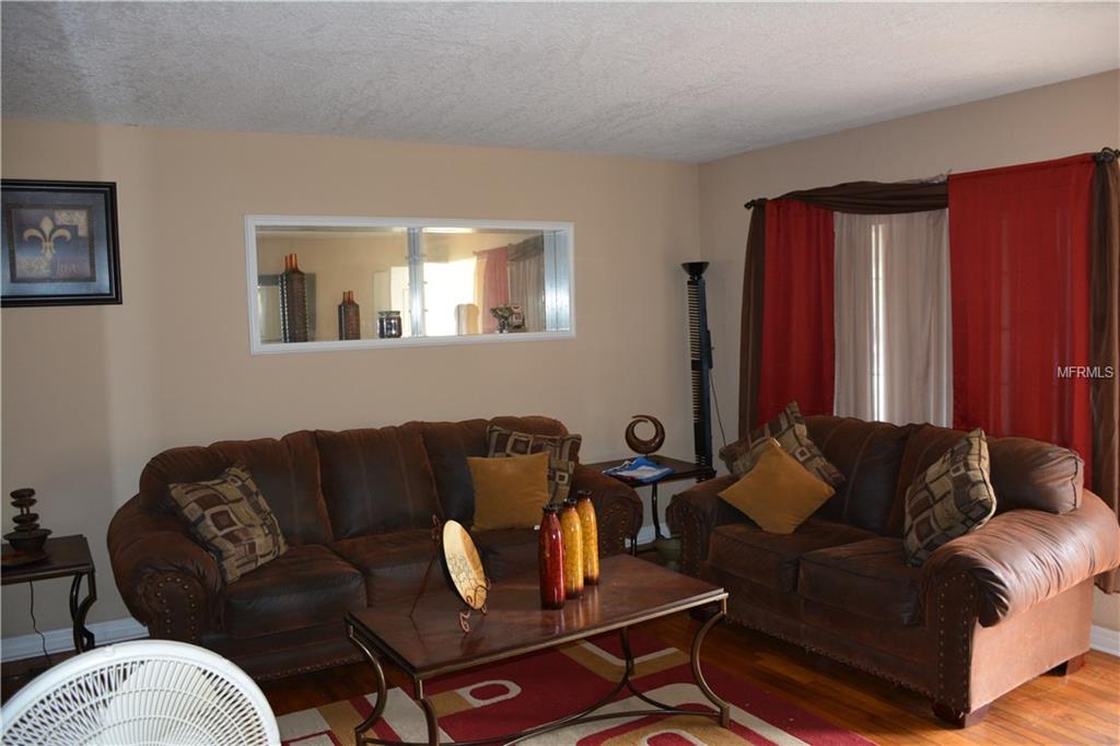 5713 PERRINE DRIVE, ORLANDO, Florida 32808, 3 Bedrooms Bedrooms, 7 Rooms Rooms,2 BathroomsBathrooms,Residential,For sale,PERRINE,O5561659