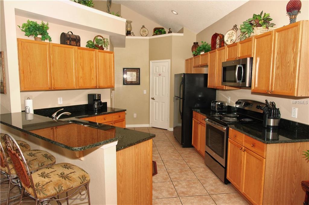 8185 FAN PALM WAY, KISSIMMEE, Florida 34747, 6 Bedrooms Bedrooms, 8 Rooms Rooms,3 BathroomsBathrooms,Residential,For sale,FAN PALM,O5533320