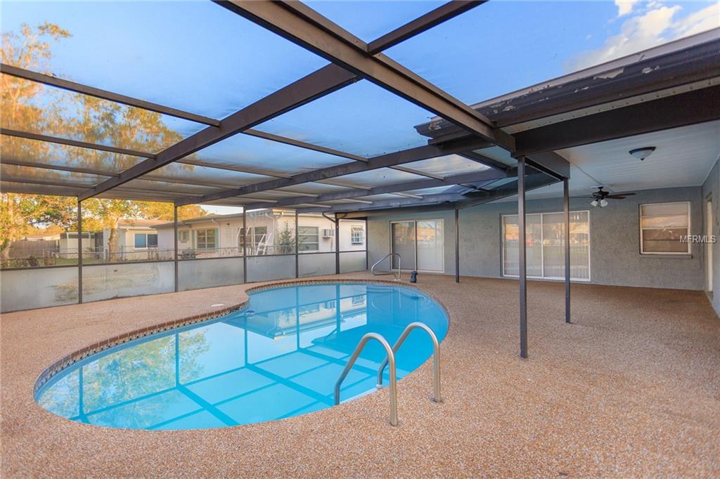 8507 FOX HOLLOW DRIVE, PORT RICHEY, Florida 34668, 3 Bedrooms Bedrooms, 6 Rooms Rooms,2 BathroomsBathrooms,Residential,For sale,FOX HOLLOW,T2919290