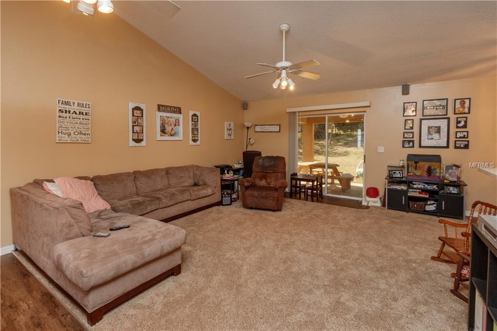 11803 GRAND HILLS BOULEVARD, CLERMONT, Florida 34711, 3 Bedrooms Bedrooms, 8 Rooms Rooms,2 BathroomsBathrooms,Residential,For sale,GRAND HILLS,O5561492