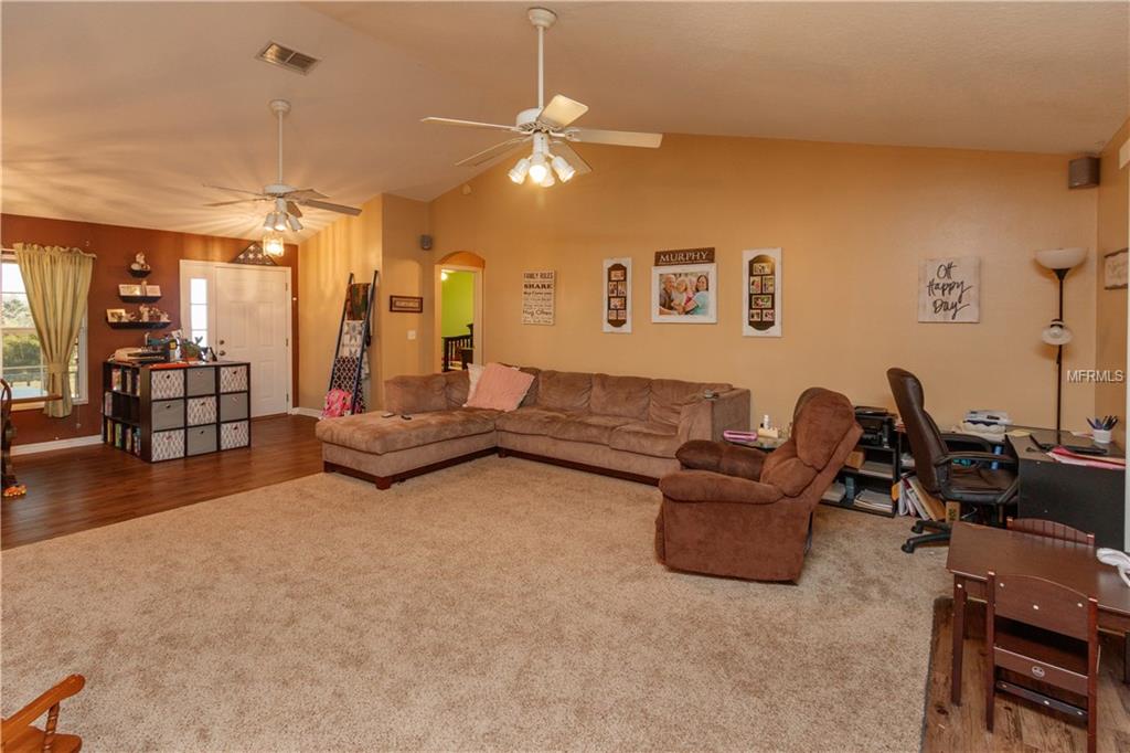 11803 GRAND HILLS BOULEVARD, CLERMONT, Florida 34711, 3 Bedrooms Bedrooms, 8 Rooms Rooms,2 BathroomsBathrooms,Residential,For sale,GRAND HILLS,O5561492