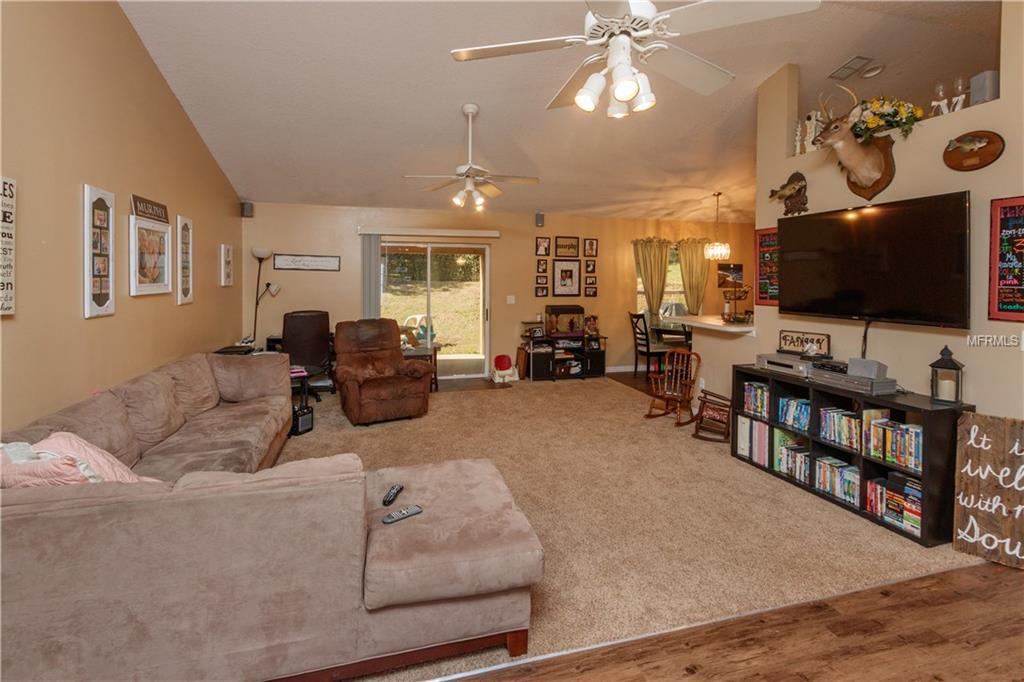 11803 GRAND HILLS BOULEVARD, CLERMONT, Florida 34711, 3 Bedrooms Bedrooms, 8 Rooms Rooms,2 BathroomsBathrooms,Residential,For sale,GRAND HILLS,O5561492