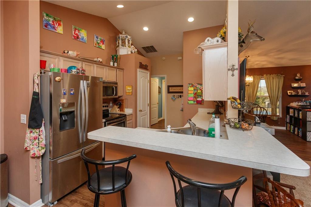 11803 GRAND HILLS BOULEVARD, CLERMONT, Florida 34711, 3 Bedrooms Bedrooms, 8 Rooms Rooms,2 BathroomsBathrooms,Residential,For sale,GRAND HILLS,O5561492