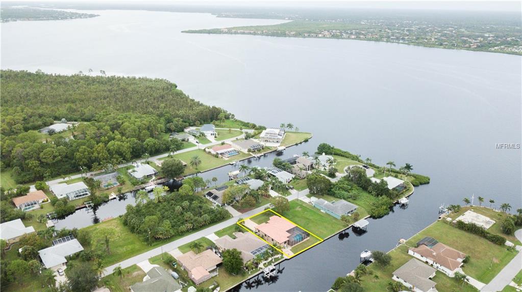 5074 ACKLEY TERRACE, PORT CHARLOTTE, Florida 33981, 4 Bedrooms Bedrooms, 8 Rooms Rooms,3 BathroomsBathrooms,Residential,For sale,ACKLEY,C7244729