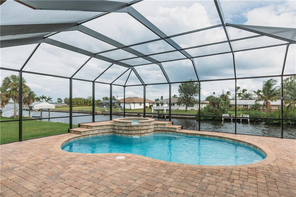 5074 ACKLEY TERRACE, PORT CHARLOTTE, Florida 33981, 4 Bedrooms Bedrooms, 8 Rooms Rooms,3 BathroomsBathrooms,Residential,For sale,ACKLEY,C7244729