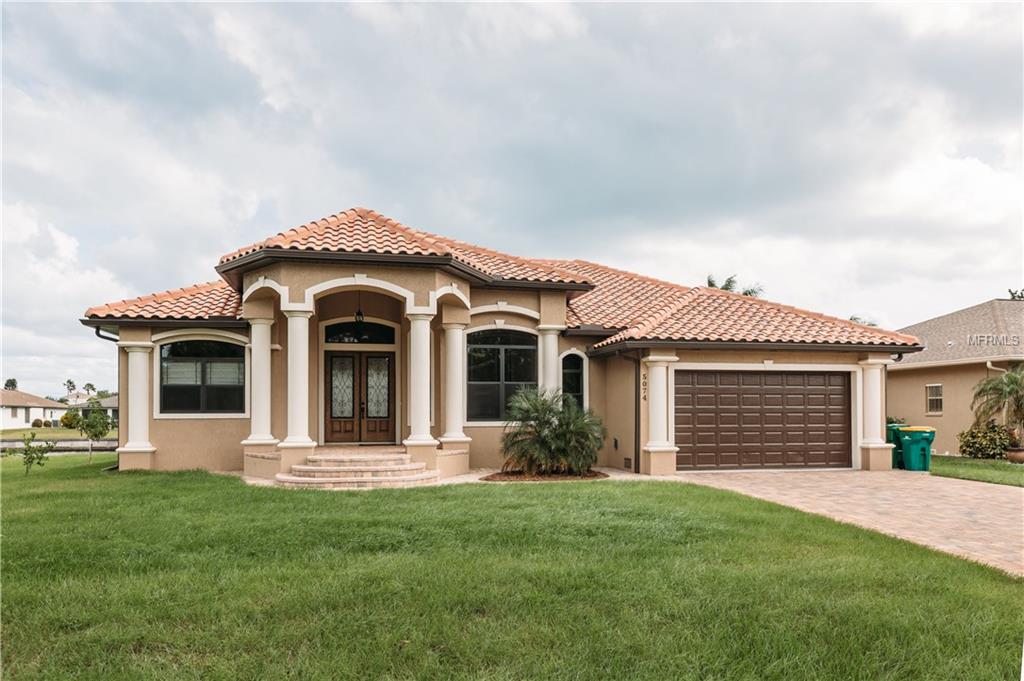 5074 ACKLEY TERRACE, PORT CHARLOTTE, Florida 33981, 4 Bedrooms Bedrooms, 8 Rooms Rooms,3 BathroomsBathrooms,Residential,For sale,ACKLEY,C7244729