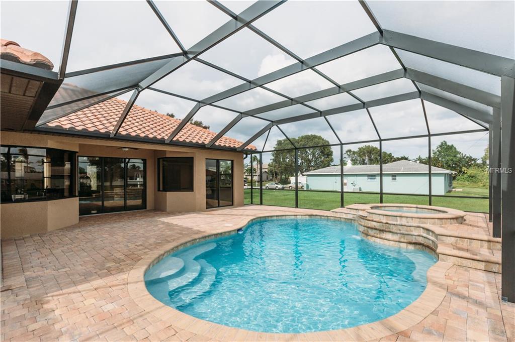 5074 ACKLEY TERRACE, PORT CHARLOTTE, Florida 33981, 4 Bedrooms Bedrooms, 8 Rooms Rooms,3 BathroomsBathrooms,Residential,For sale,ACKLEY,C7244729