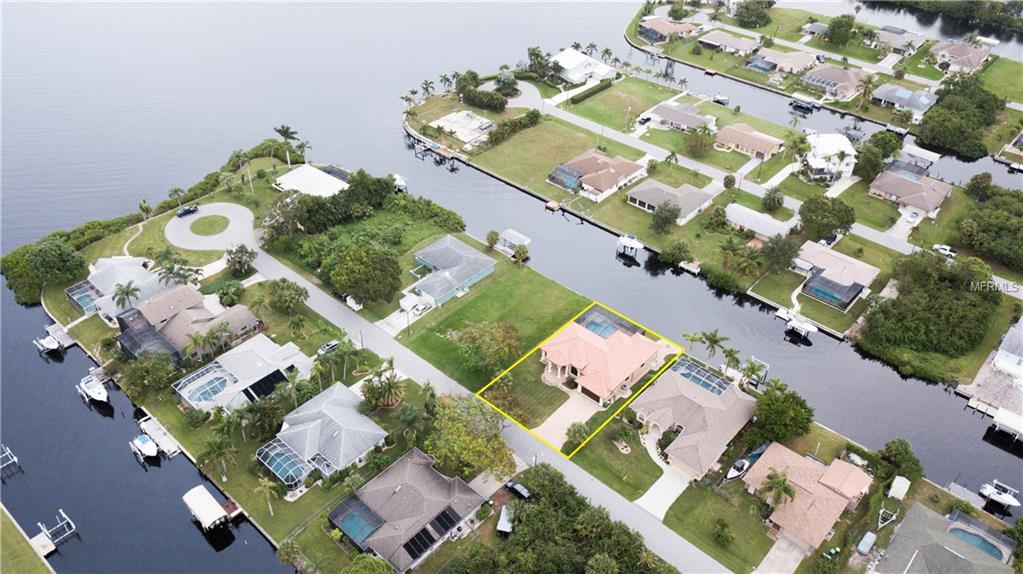 5074 ACKLEY TERRACE, PORT CHARLOTTE, Florida 33981, 4 Bedrooms Bedrooms, 8 Rooms Rooms,3 BathroomsBathrooms,Residential,For sale,ACKLEY,C7244729