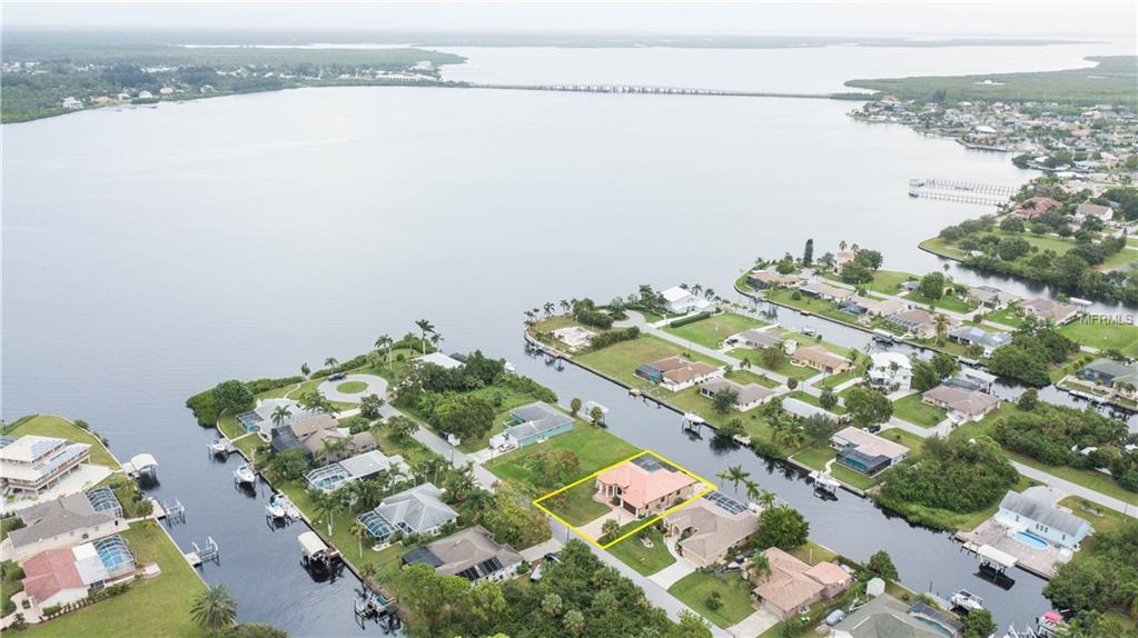 5074 ACKLEY TERRACE, PORT CHARLOTTE, Florida 33981, 4 Bedrooms Bedrooms, 8 Rooms Rooms,3 BathroomsBathrooms,Residential,For sale,ACKLEY,C7244729