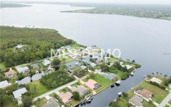 5074 ACKLEY TERRACE, PORT CHARLOTTE, Florida 33981, 4 Bedrooms Bedrooms, 8 Rooms Rooms,3 BathroomsBathrooms,Residential,For sale,ACKLEY,C7244729