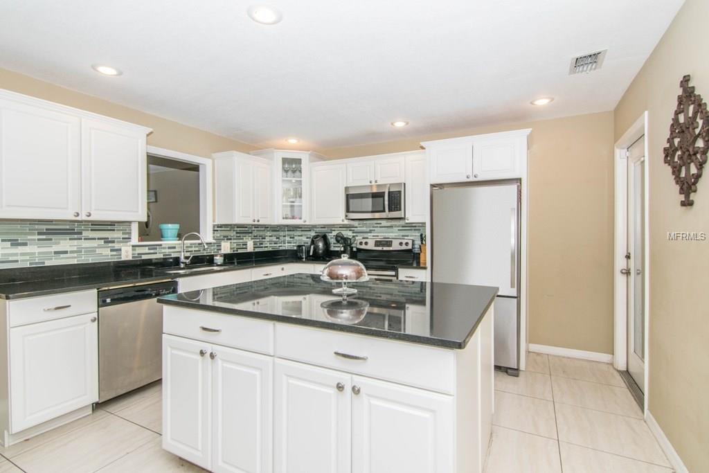 6513 N MANHATTAN AVENUE, TAMPA, Florida 33614, 3 Bedrooms Bedrooms, 7 Rooms Rooms,2 BathroomsBathrooms,Residential,For sale,MANHATTAN,T2928380