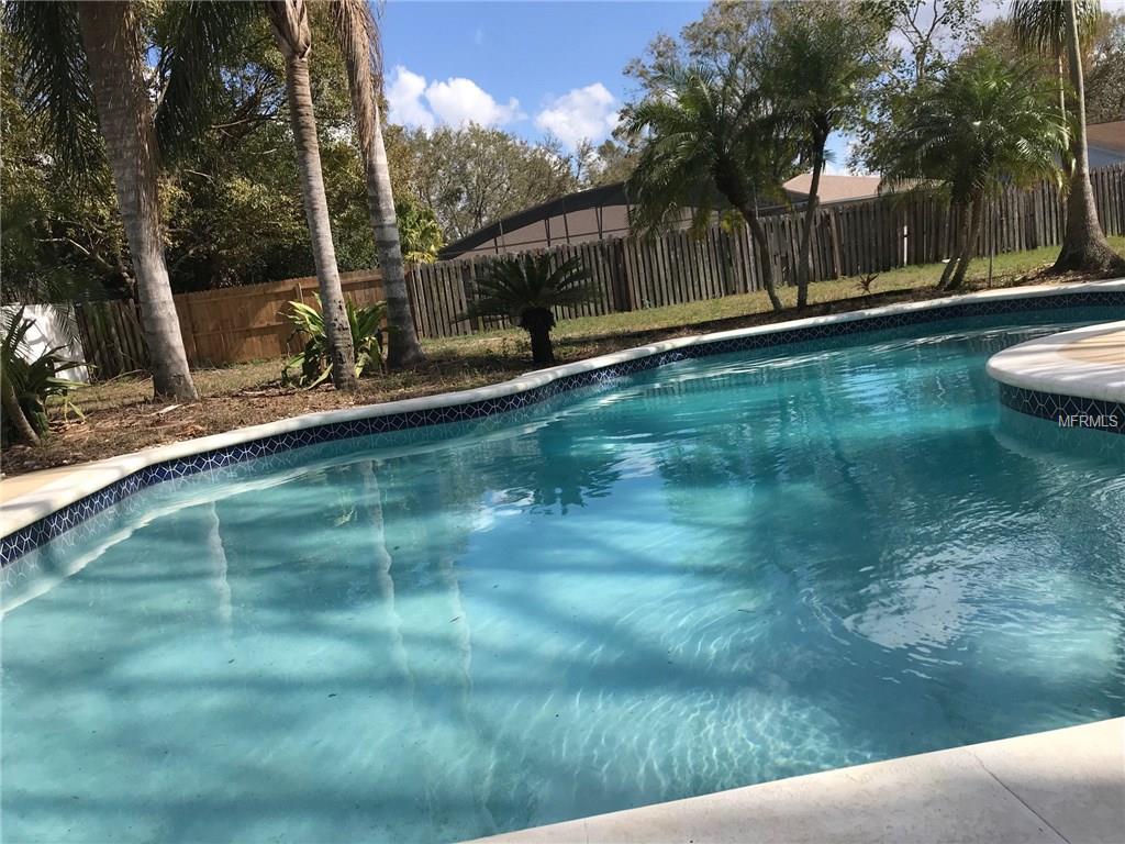 6311 ORANGE COVE DRIVE, ORLANDO, Florida 32819, 3 Bedrooms Bedrooms, 5 Rooms Rooms,3 BathroomsBathrooms,Residential,For sale,ORANGE COVE,O5548811