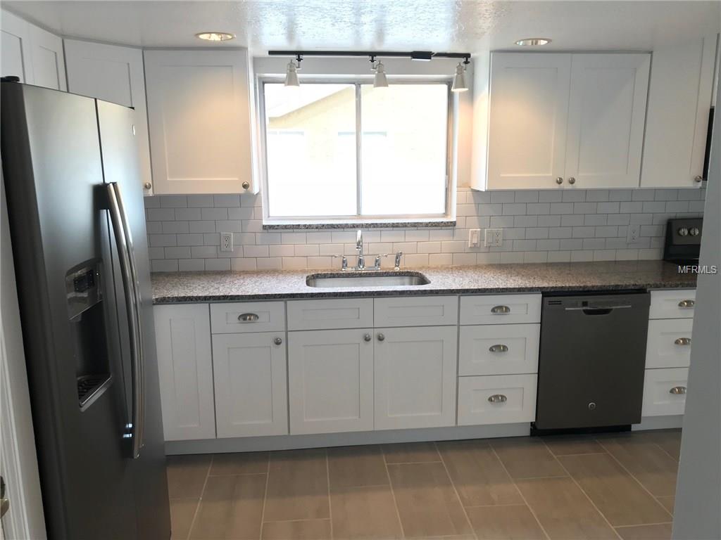 6311 ORANGE COVE DRIVE, ORLANDO, Florida 32819, 3 Bedrooms Bedrooms, 5 Rooms Rooms,3 BathroomsBathrooms,Residential,For sale,ORANGE COVE,O5548811