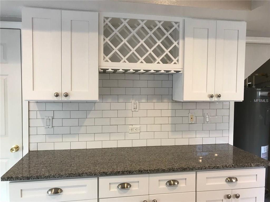 6311 ORANGE COVE DRIVE, ORLANDO, Florida 32819, 3 Bedrooms Bedrooms, 5 Rooms Rooms,3 BathroomsBathrooms,Residential,For sale,ORANGE COVE,O5548811