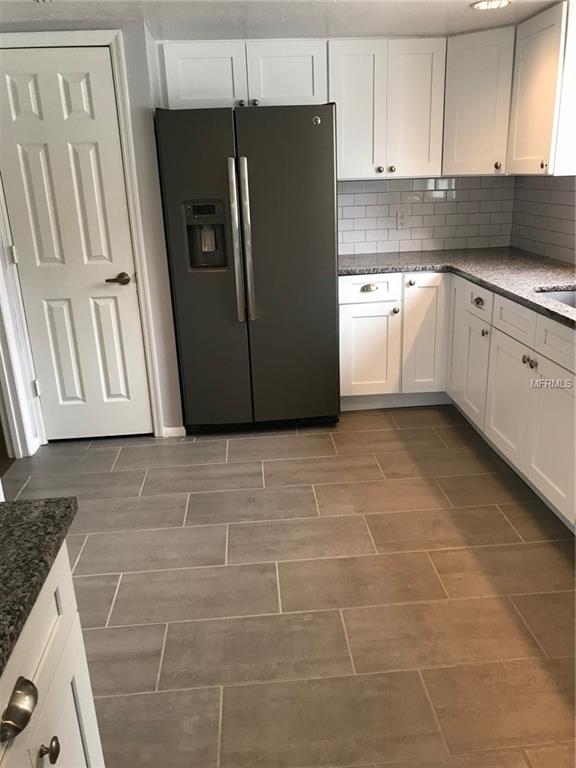 6311 ORANGE COVE DRIVE, ORLANDO, Florida 32819, 3 Bedrooms Bedrooms, 5 Rooms Rooms,3 BathroomsBathrooms,Residential,For sale,ORANGE COVE,O5548811