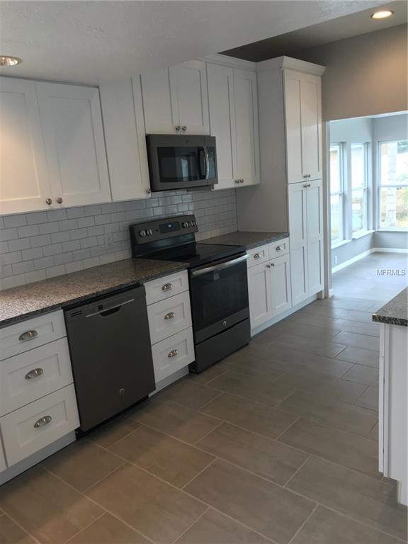 6311 ORANGE COVE DRIVE, ORLANDO, Florida 32819, 3 Bedrooms Bedrooms, 5 Rooms Rooms,3 BathroomsBathrooms,Residential,For sale,ORANGE COVE,O5548811