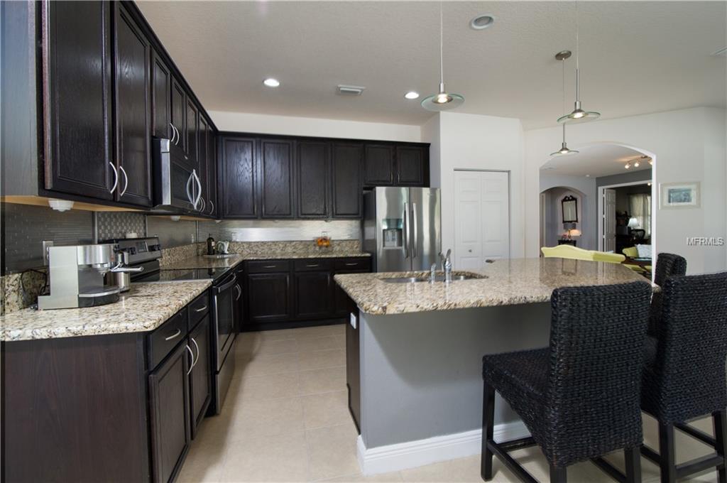 4435 AZURE ISLE WAY, KISSIMMEE, Florida 34744, 5 Bedrooms Bedrooms, 8 Rooms Rooms,3 BathroomsBathrooms,Residential,For sale,AZURE ISLE,O5552685