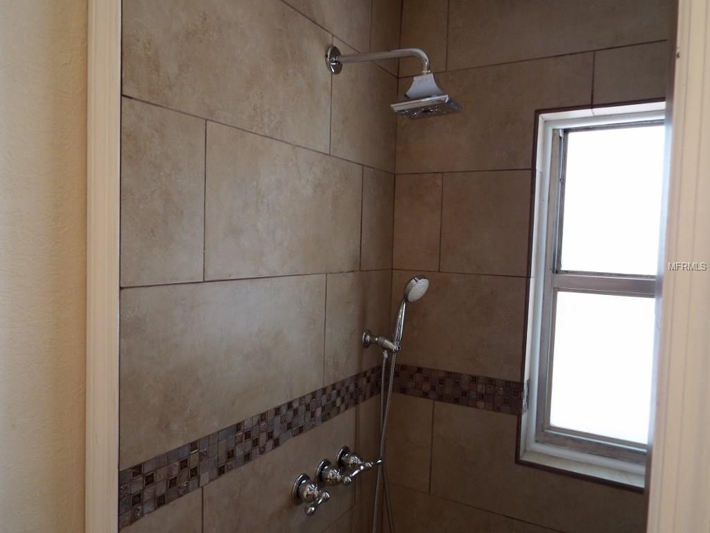 4401 W WISCONSIN AVENUE, TAMPA, Florida 33616, 4 Bedrooms Bedrooms, 8 Rooms Rooms,2 BathroomsBathrooms,Residential,For sale,WISCONSIN,T2891996