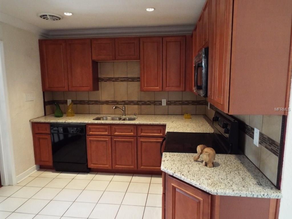 4401 W WISCONSIN AVENUE, TAMPA, Florida 33616, 4 Bedrooms Bedrooms, 8 Rooms Rooms,2 BathroomsBathrooms,Residential,For sale,WISCONSIN,T2891996