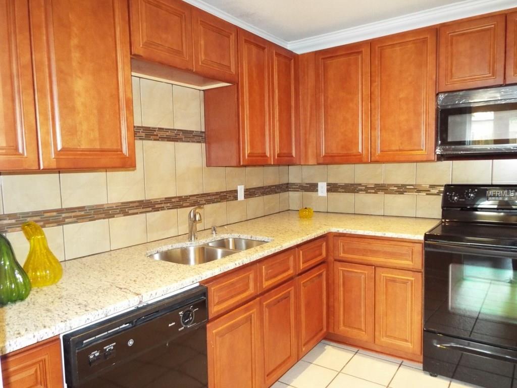 4401 W WISCONSIN AVENUE, TAMPA, Florida 33616, 4 Bedrooms Bedrooms, 8 Rooms Rooms,2 BathroomsBathrooms,Residential,For sale,WISCONSIN,T2891996