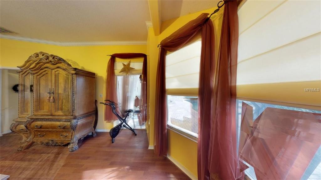 3442 WOODRIDGE PARKWAY, PALM HARBOR, Florida 34684, 4 Bedrooms Bedrooms, 5 Rooms Rooms,3 BathroomsBathrooms,Residential,For sale,WOODRIDGE,U7847044