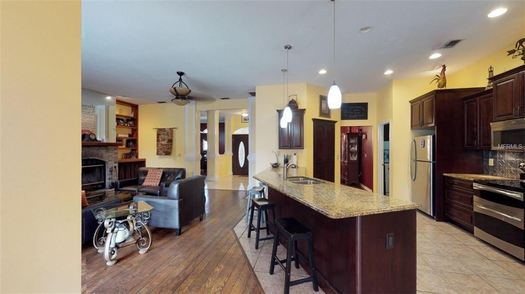 3442 WOODRIDGE PARKWAY, PALM HARBOR, Florida 34684, 4 Bedrooms Bedrooms, 5 Rooms Rooms,3 BathroomsBathrooms,Residential,For sale,WOODRIDGE,U7847044