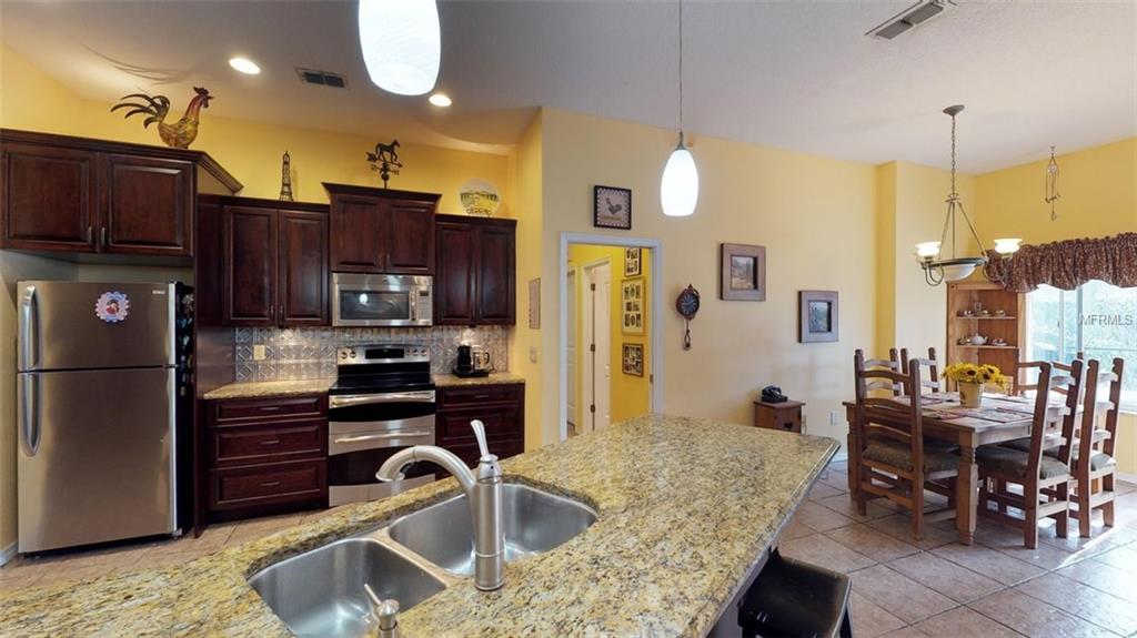 3442 WOODRIDGE PARKWAY, PALM HARBOR, Florida 34684, 4 Bedrooms Bedrooms, 5 Rooms Rooms,3 BathroomsBathrooms,Residential,For sale,WOODRIDGE,U7847044