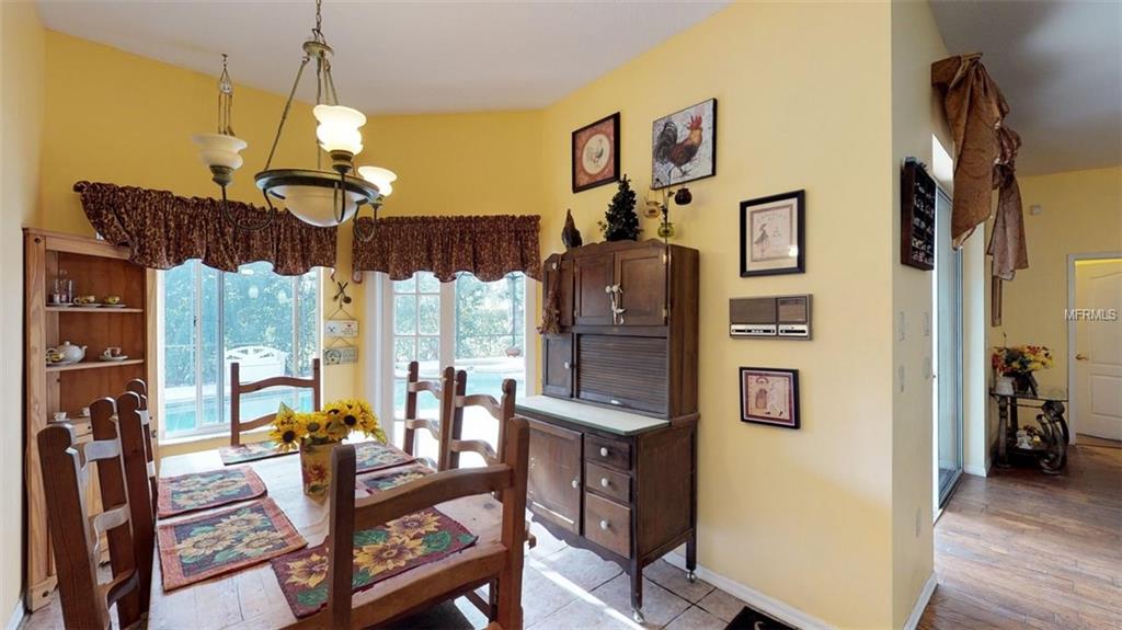 3442 WOODRIDGE PARKWAY, PALM HARBOR, Florida 34684, 4 Bedrooms Bedrooms, 5 Rooms Rooms,3 BathroomsBathrooms,Residential,For sale,WOODRIDGE,U7847044